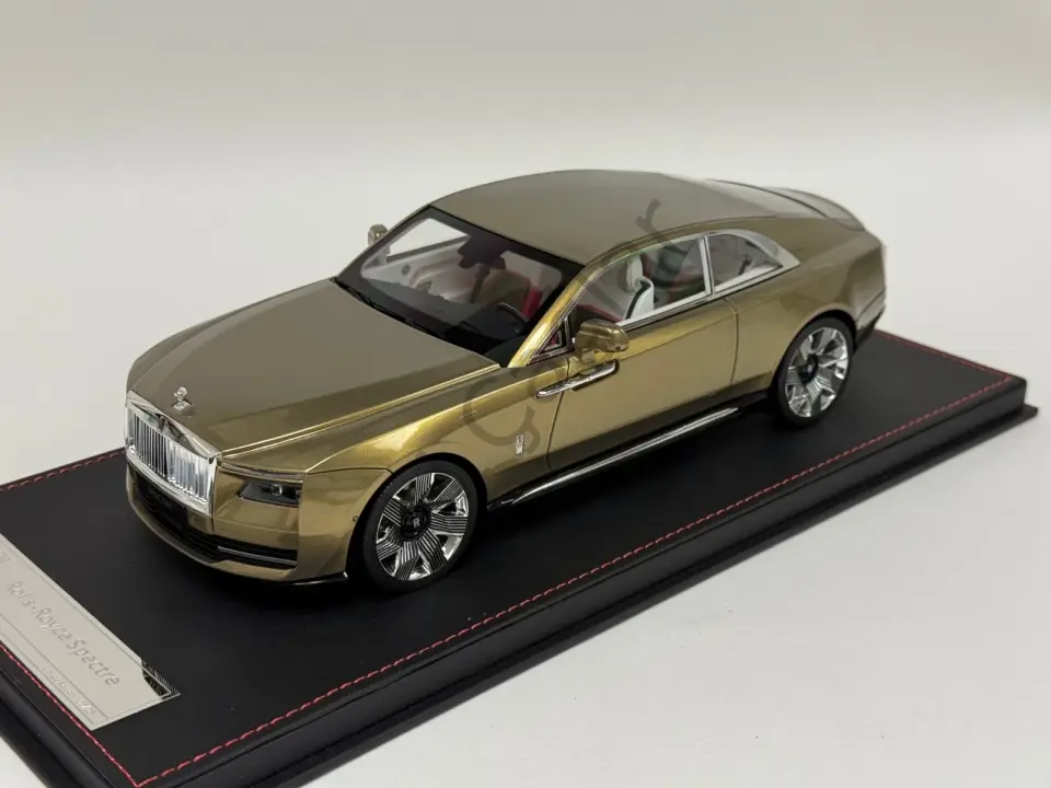 1:18 DF Models Rolls Royce Spectre in Gold limited on a black leather base